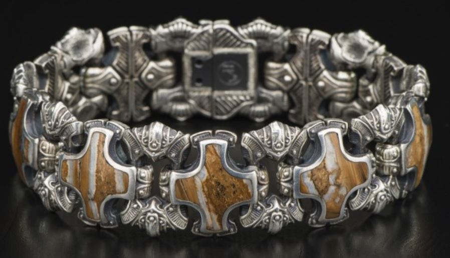 William Henry Sterling Silver Shield Bracelet Having Inlaid Fossil Woolly Mammoth Tooth Alternating With Openwork Carved Links And A Stainless Steel Clasp Inset With One Diamond